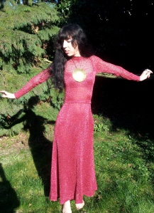 My newest addition to my collection of vintage lurex: a 70s ankle-length frock in raspberry pink sparkles. Yum.